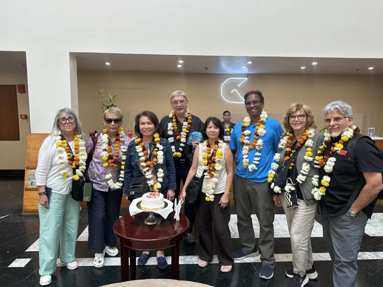 Travellers from the USA welcomed with marigold garlands in India